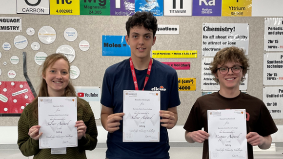 Photograph - L-R A Level Chemistry students Epernay Dale, Brandon McKnight and Daniel Sutherland.