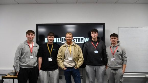 Photograph - Left to right students Jake Wilkinson, Alfie Exton, Harvey Roby-Watson and Freddie Johnson, with Pete Shaw owner of Barnsley Barbell (centre).